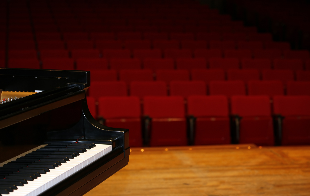 Grand piano on stage